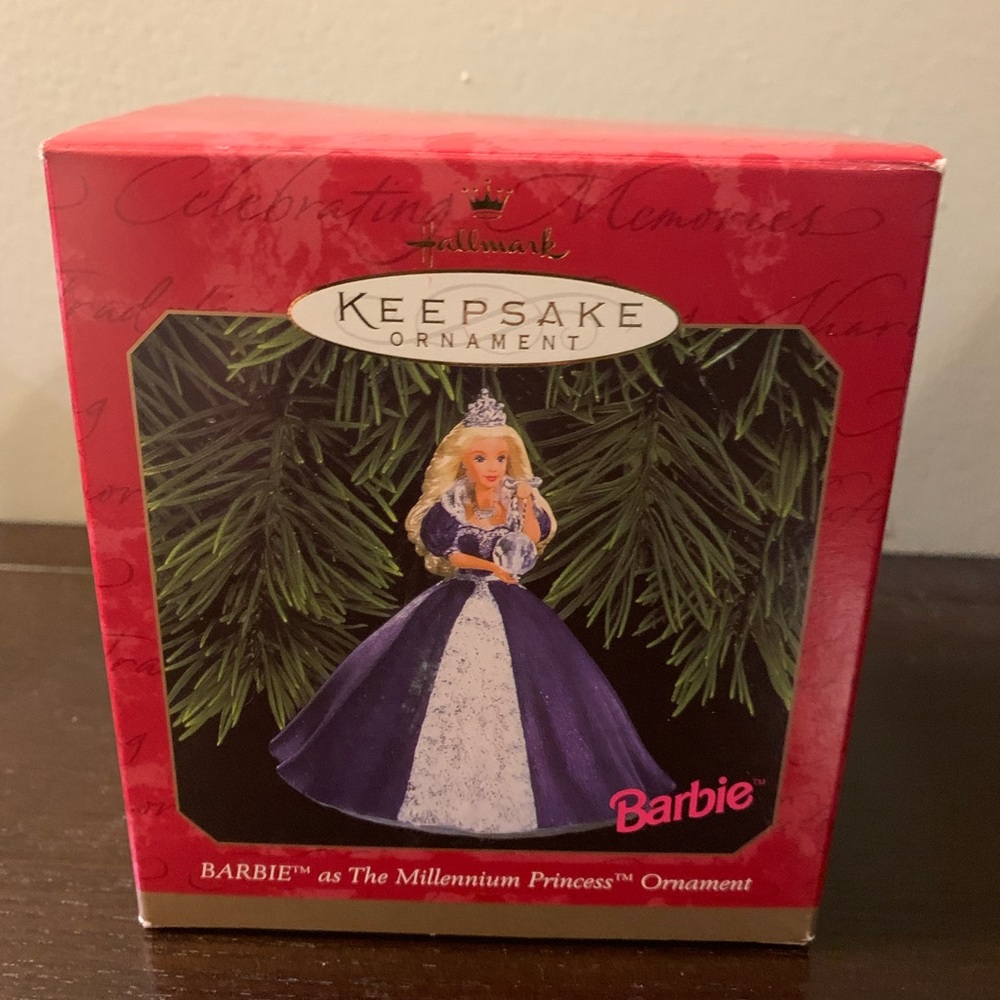 New w/t Barbie ornament. Purple and withe colors it’s a collection item.